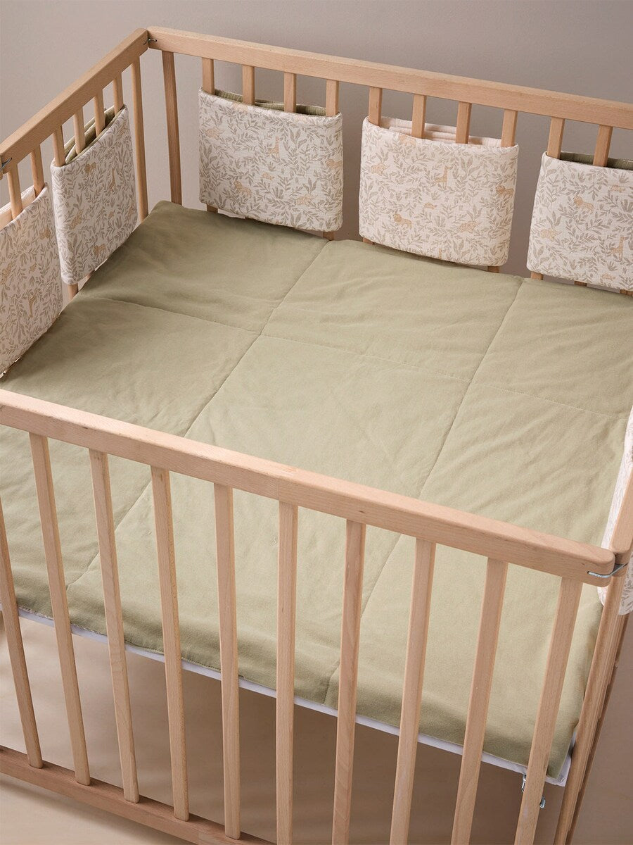 Bakside av vendbar sengebeskytter for babyseng og lekegrind BABYLON