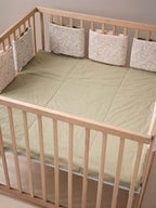 Bakside av vendbar sengebeskytter for babyseng og lekegrind BABYLON
