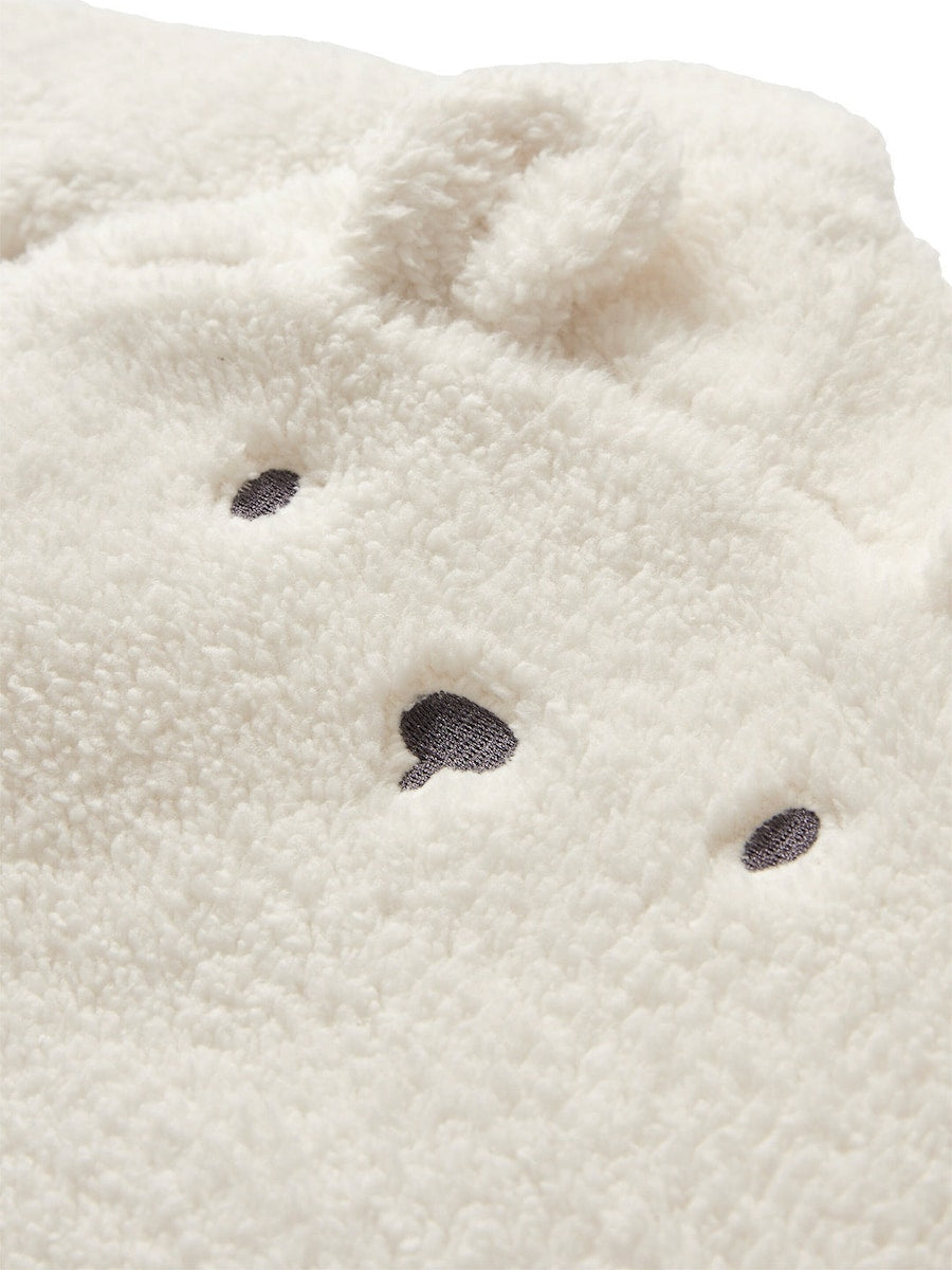 Nærbilde av teddyfleece materiale på Vintersovepose med avtakbare ermer teddyfleece TOG 3