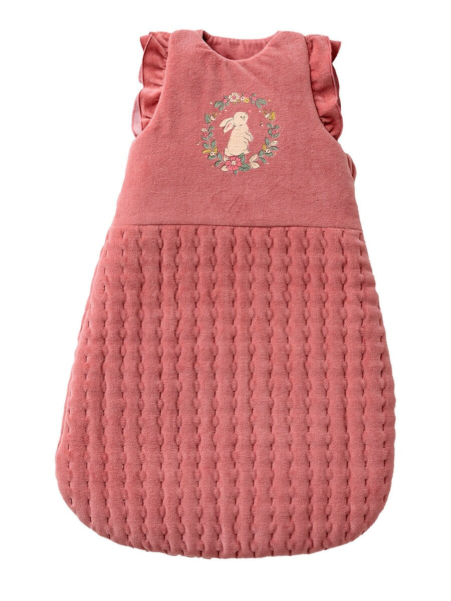 Vintersovepose for baby med volang og avtagbare ermer forfra