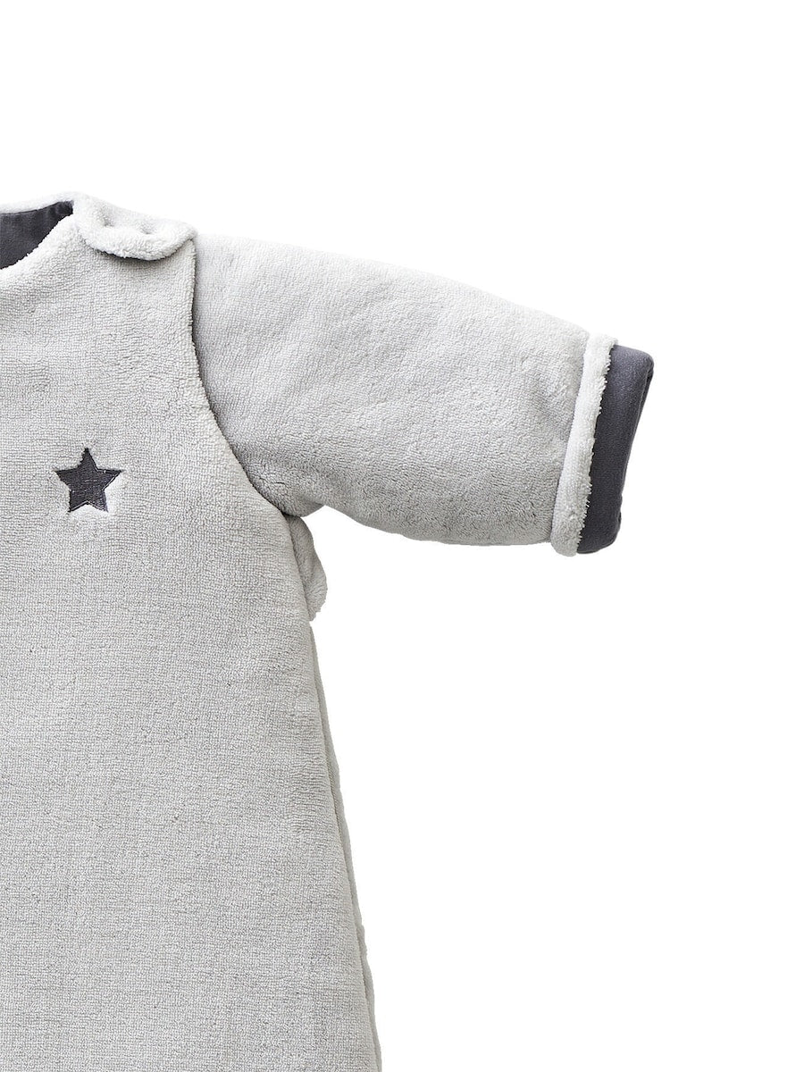 Detalj av avtagbare ermer på Vintersovepose for baby ALASKA