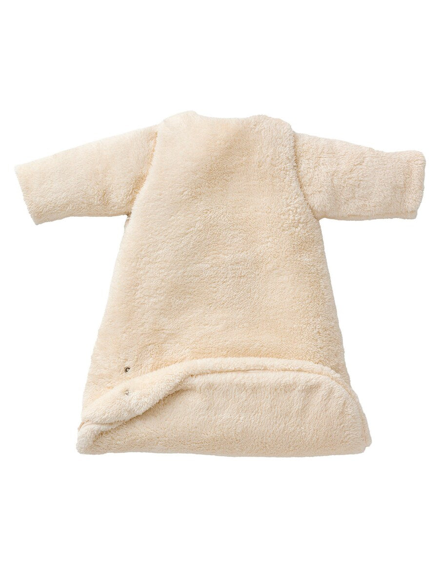 Detalj av teddyfleece på vintersovepose for baby med avtagbare ermer