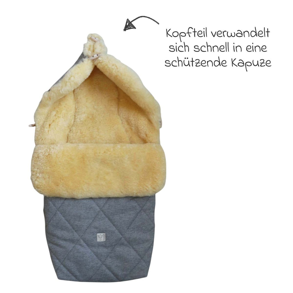 Vognpose Coosy i lammeskinn 85 x 45 cm pakket for sending